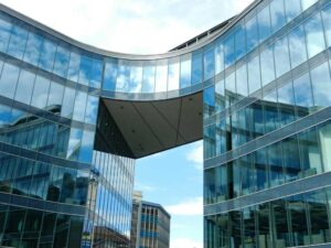 A photo of glass buildings during daylight.